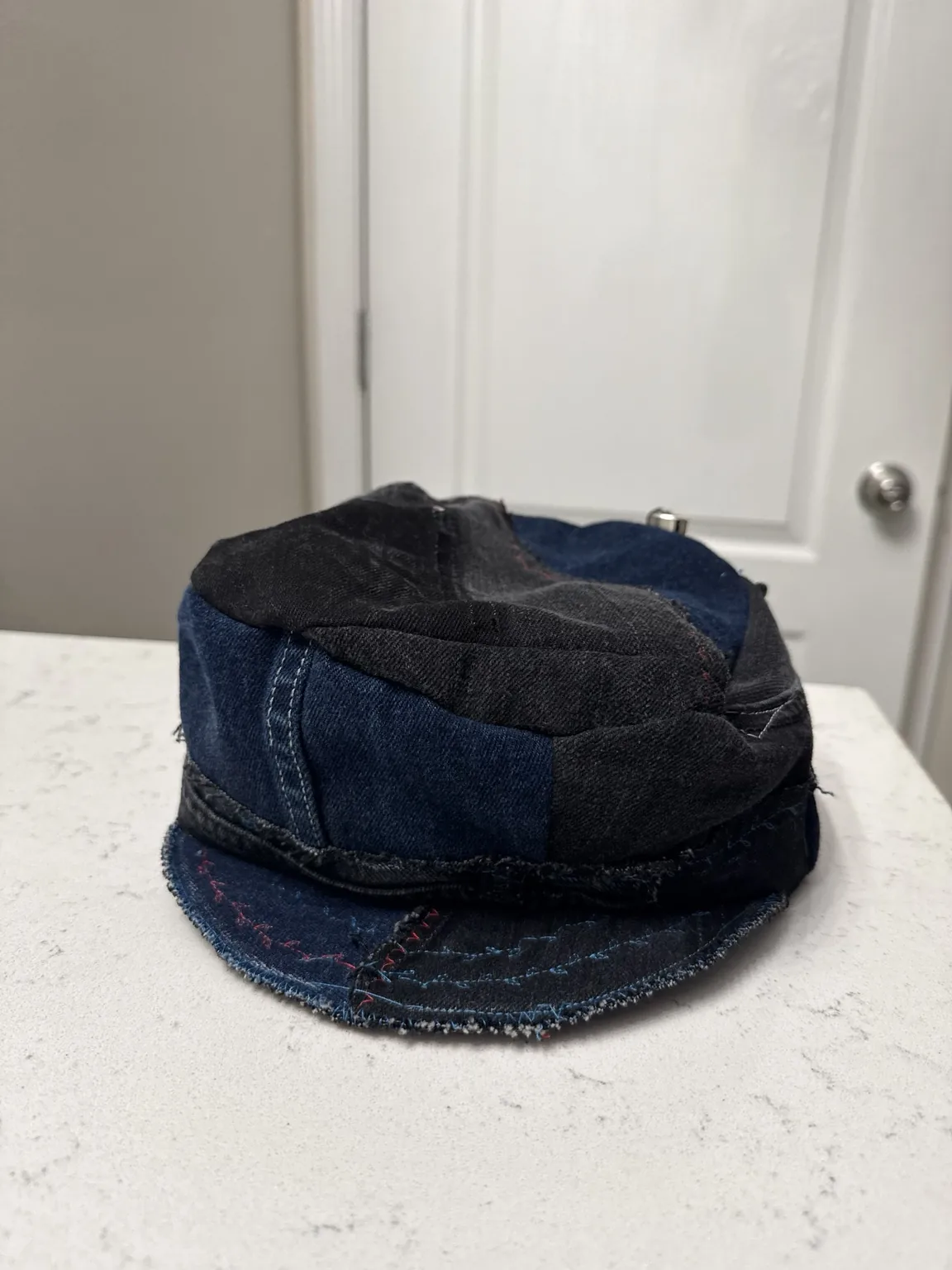 Blue and black patchwork denim cap made by TECAY
